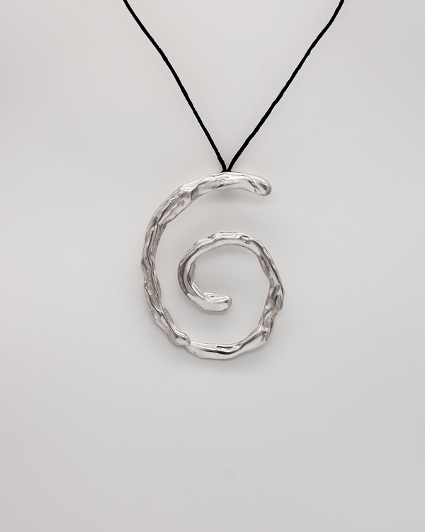 Silver spiral pendant on a black cord